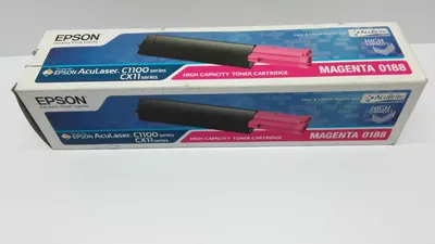 Two identical boxes of Epson toner cartridges are shown stacked on top of each other.