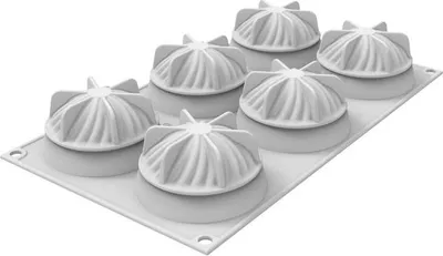 A white silicone mold for making small, wave-shaped desserts or chocolates.