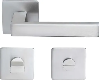 A set of door handles and related hardware, made of brushed metal, displayed against a white background.