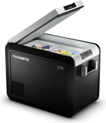 A Dometic CFX3 45 AC/DC compressor cooler box is shown with its lid open, revealing food items inside. The cooler is black and gray with a white lid.