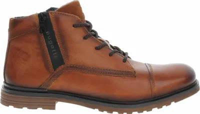 A side view of a brown leather boot.