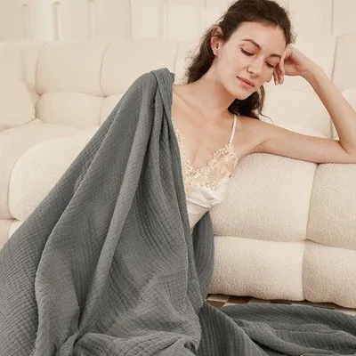 Immagine prodotto di Coperta in mussola di cotone Unyqoos® a quattro strati, 100% cotone, 127 x 152 cm – coperta traspirante, delicata sulla pelle, per il comfort e per i viaggi, adatta a adulti e bambini
