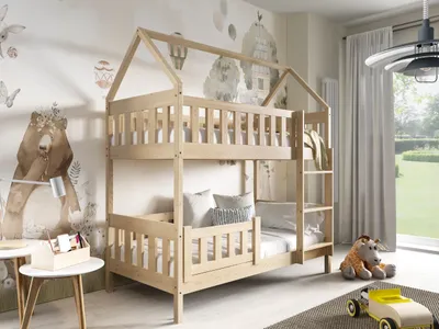 A child's bedroom with a bunk bed and themed wallpaper.