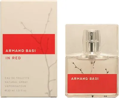 A product shot of a perfume bottle and its packaging.