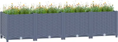 A long, rectangular planter box filled with flowers.