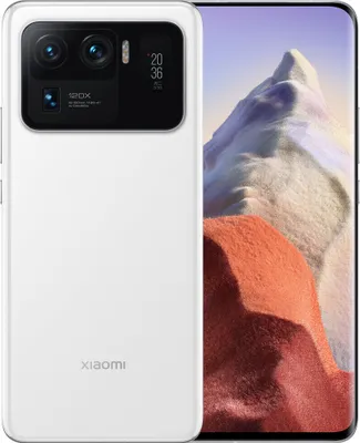 A white Xiaomi Mi 11 Ultra smartphone is shown from the back, with its camera module prominently displayed. The phone is placed next to a colorful, abstract background.