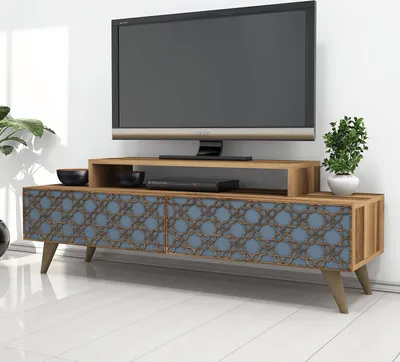 A TV stand with a television on top, placed in a room.