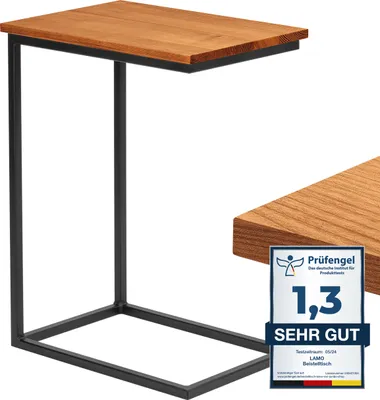 A modern side table with a wooden top and black metal frame, shown against a white background. A close-up of the wooden tabletop is visible in the lower right corner, along with a quality seal.