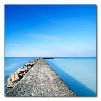 Produktbild von Wallario selbstklebende Möbelfolie/ Tischdecke für Innen und Außen, Größe: 100 x 100 cm - Pier am blauen Ozean mit blauem Himmel