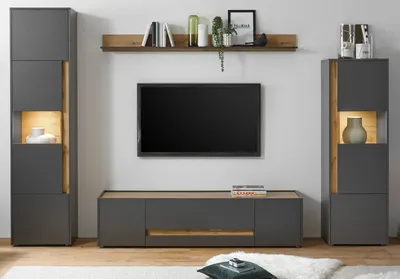 A modern living room setup featuring a TV and media console.