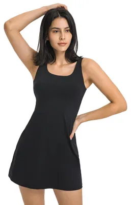 Produktbild von Tennis Kleid mit integrierten Shorts und BH - Ärmellos - 2-in-1 - Mit Taschen - Premium Stoff - Für Damen und große Mädchen - Sportkleid