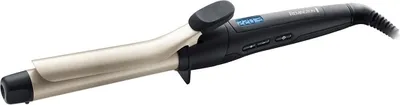 A black and gold Remington curling iron is shown against a white background.