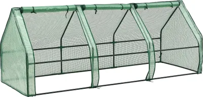 A green mini greenhouse with a metal frame, shown from a diagonal angle against a white background.