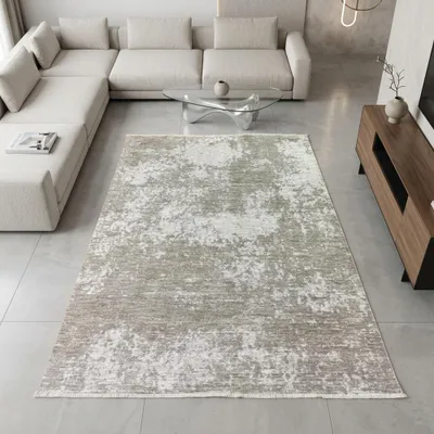 Image de Tapis moderne beige crème avec motif abstrait et franges. Dimensions : 200 x 290 cm