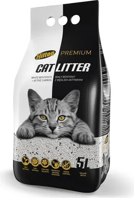 A bag of Hilton cat litter with a cat peeking over the top.