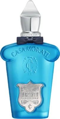 A studio shot of a blue perfume bottle with silver accents and a navy ribbon.