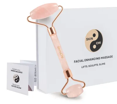 Imagen del producto de Rodillo de masaje facial de doble extremo, hecho de cuarzo rosa, para el cuidado de la piel