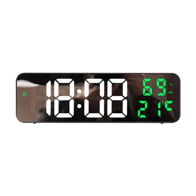 A digital clock displaying time, temperature, and humidity.