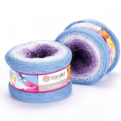 Two balls of yarn with a gradient color pattern.