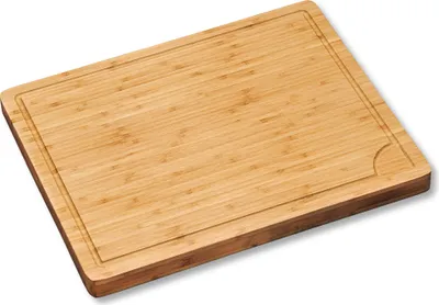 A bamboo cutting board is shown from a slightly elevated angle against a white background.