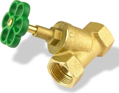 A close-up studio shot of a brass shut-off valve with a green handle.