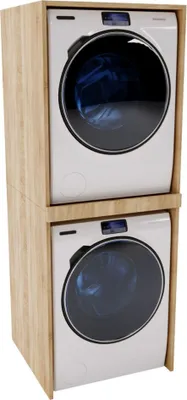 A stacked washing machine and dryer unit within a wooden frame.