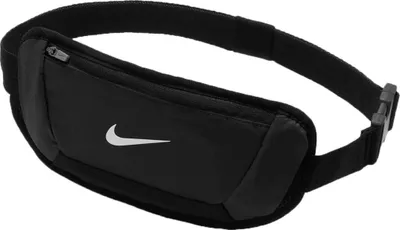 A black Nike fanny pack is shown against a white background.