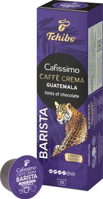 A box of Tchibo Cafissimo coffee capsules with a single capsule in the foreground.