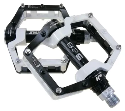 Imagen del producto de Pedal para bicicleta de montaña, fabricado en aleación de aluminio, con superficie antideslizante y cojinete sellado
