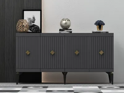 A dark gray sideboard with gold diamond-shaped handles is displayed against a white and dark gray wall.