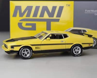 Immagine prodotto di FORD MUSTANG MACH 1, colore giallo "Grabber", anno 1971 - Mini GT, scala 1:64