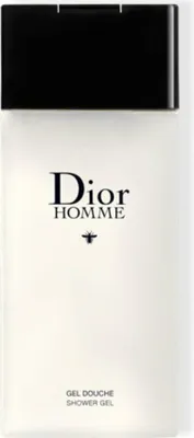 A white bottle of Dior Homme shower gel with a black cap.