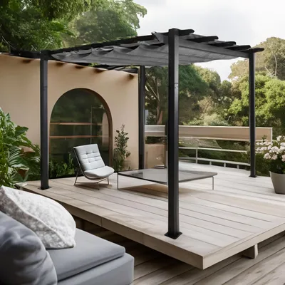 An outdoor patio scene featuring a modern pergola with a retractable canopy, a lounge chair, and a coffee table on a wooden deck.