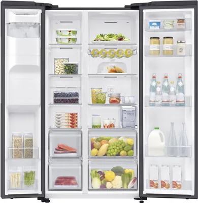 The interior of an open refrigerator, showing various food items and storage compartments.