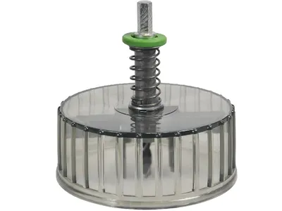 A close-up studio shot of a circular cutting tool with a spring-loaded mechanism.