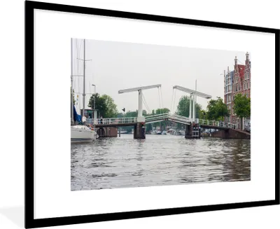 Produktbild von MuchoWow® Gerahmtes Poster Haarlem - Wasser - Niederlande 90x60 cm - Poster mit Schwarzem Bilderrahmen Wandposter Rahmen Foto Bilder - Wanddekoration - Fotos