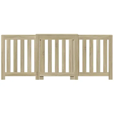 A wooden gate with vertical slats.
