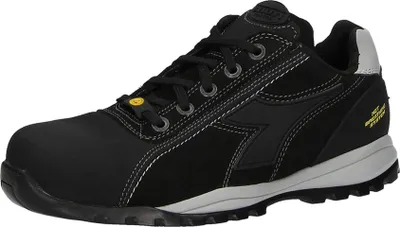 A black Diadora safety shoe is shown from the side on a white background.