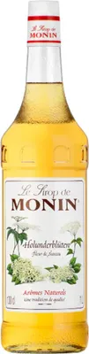 A bottle of Monin Elderflower syrup.