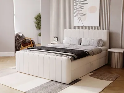 A bedroom scene with a bed as the main focus.