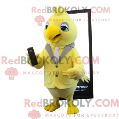 Productafbeelding van Mascottekarakter REDBROKOLY van een citroengele duif gekleed met een T-shirt met V-hals en pochetten