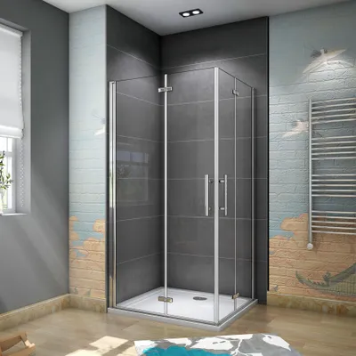 A modern bathroom with a glass shower enclosure.