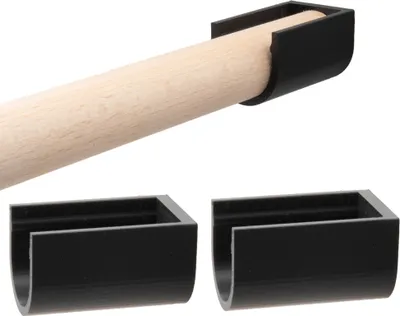 A wooden dowel is held in place by black brackets. Two additional black brackets are shown below.
