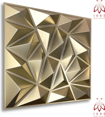 A 3D geometric wall panel with a metallic gold finish.