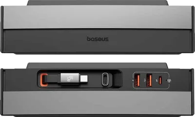 A product shot of a black and gray USB hub with orange accents, showing its ports and an integrated cable.