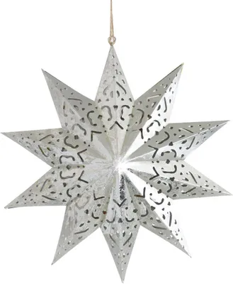 A decorative star ornament hanging from a string.