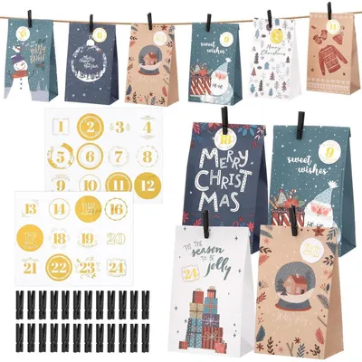 Productafbeelding van Adventskalender om zelf te vullen, voor 2026, met 24 grote papieren zakjes, voorzien van cijferstickers en sluitingen, van kraftpapier, in de kleuren blauw, wit en bruin