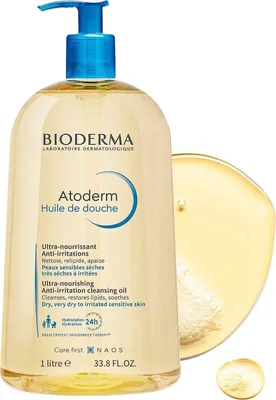 A large bottle of Bioderma Atoderm Huile de douche with a small sample of the product next to it.