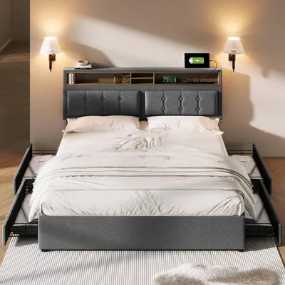 A bed with a headboard featuring storage and charging ports, set in a bedroom.