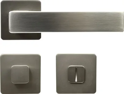 A set of door hardware components, including a door handle and two escutcheons, displayed against a white background.